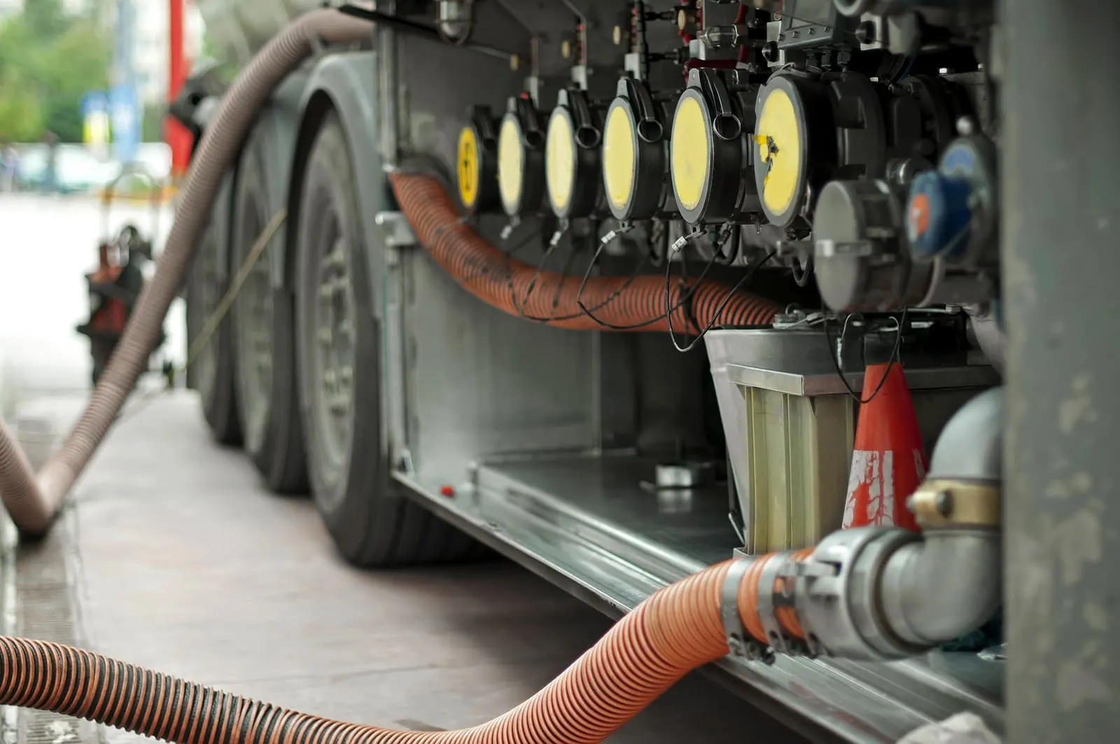 Fuel delivery truck meters and hoses used for ground support equipment fueling