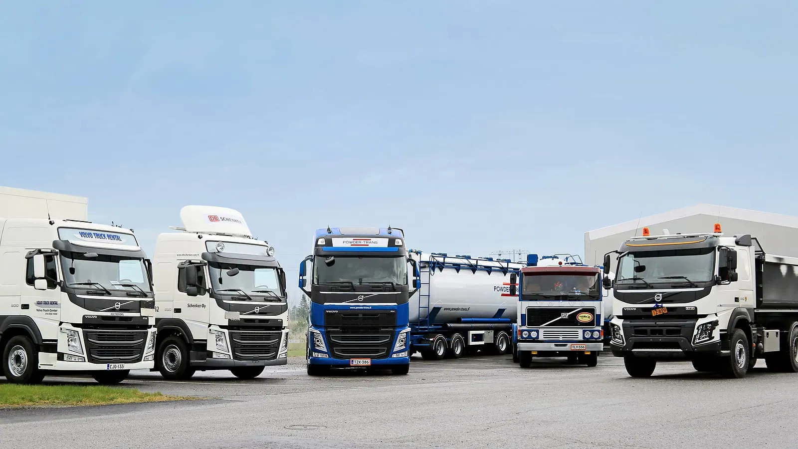 Commercial trucks lined up at a terminal for on-site fueling